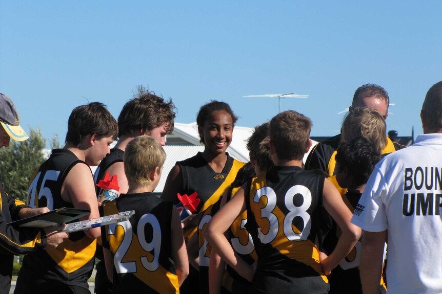 Sabrina Frederick Traub playing in a junior boys' AFL team in Perth