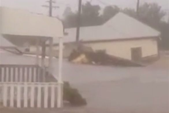 A house is washed away by floodwaters in Dungog, where three people died during the April storms.