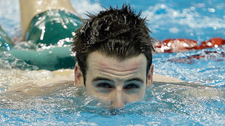 Australian swimmer James Magnussen emerges from the pool