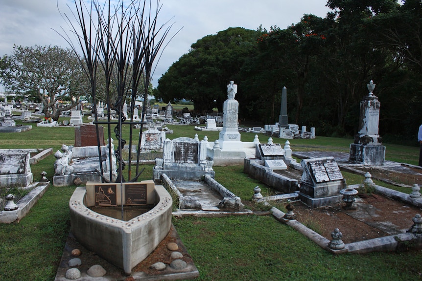 Grave with ship anchor and sugar cane memorial