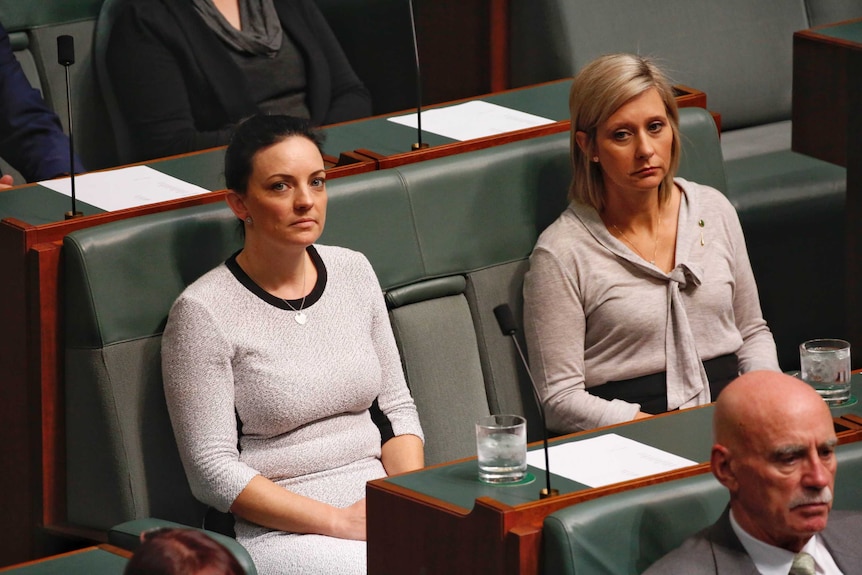 Emma Husar and Susan Lamb sit next to each other in parliament.