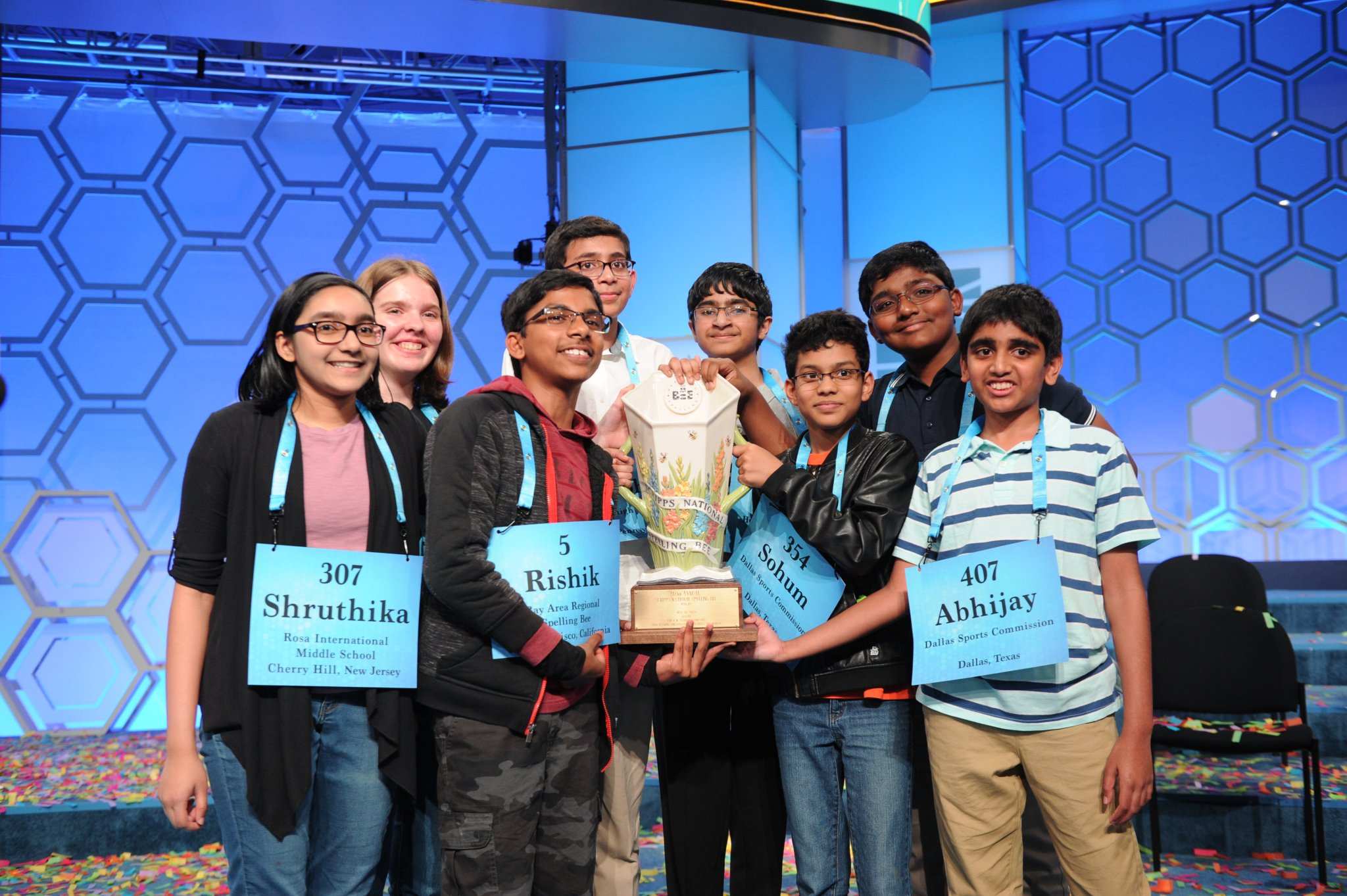 The eight co-champions celebrate after winning the Scripps National Spelling Bee.