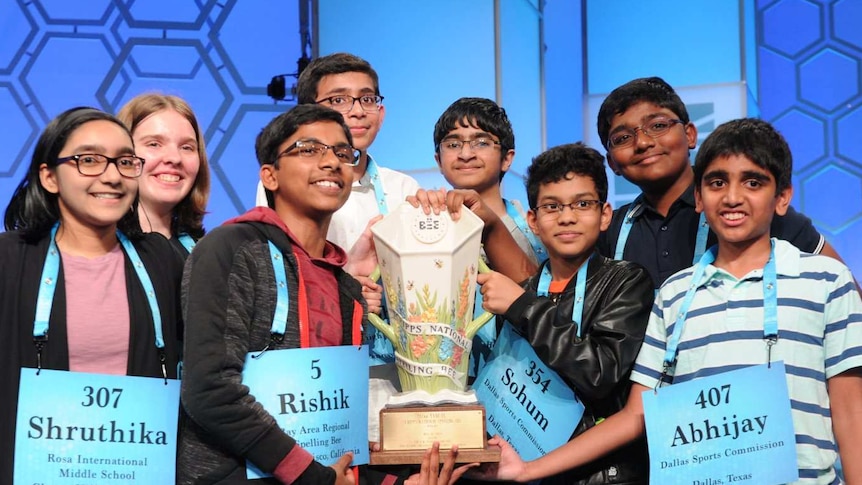 The eight co-champions celebrate after winning the Scripps National Spelling Bee.