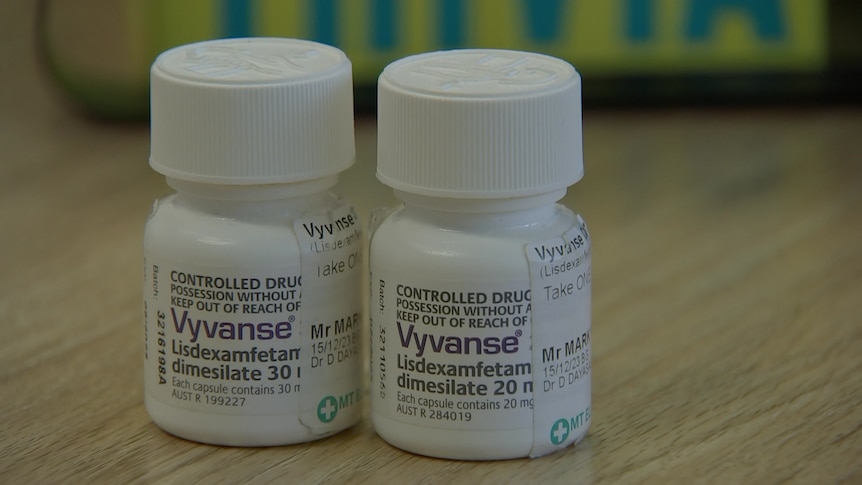 Two prescription bottles of Vyvanse.