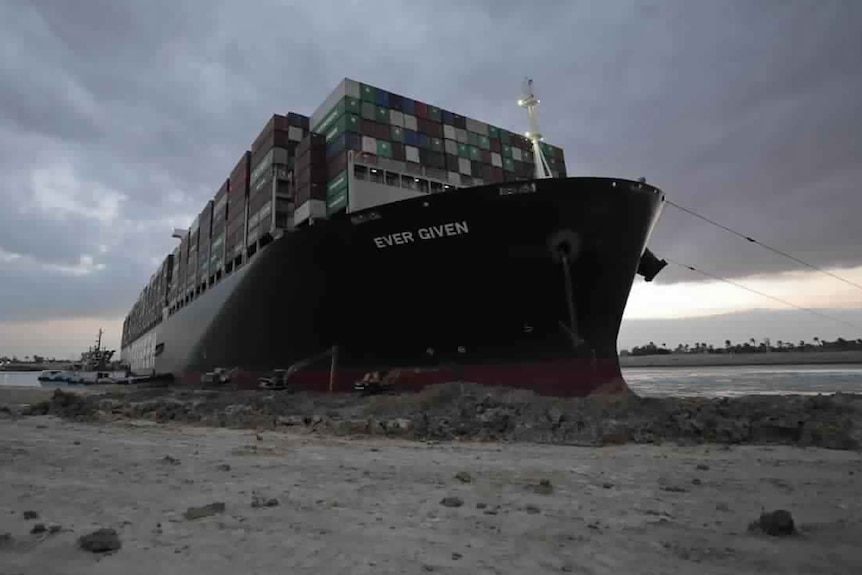 The bow of the Ever Given wedged into the banks of the Suez.