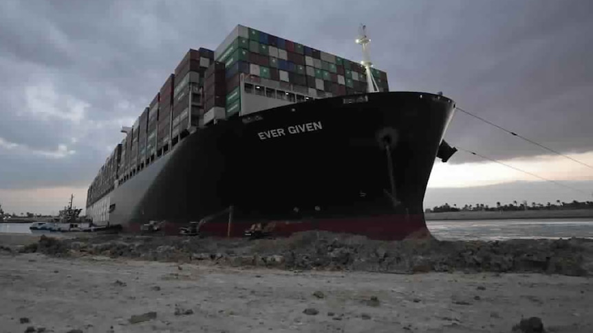 The bow of the Ever Given wedged into the banks of the Suez.