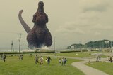 Children flee Godzilla in a scene from the 2016 film Shin Godzilla.