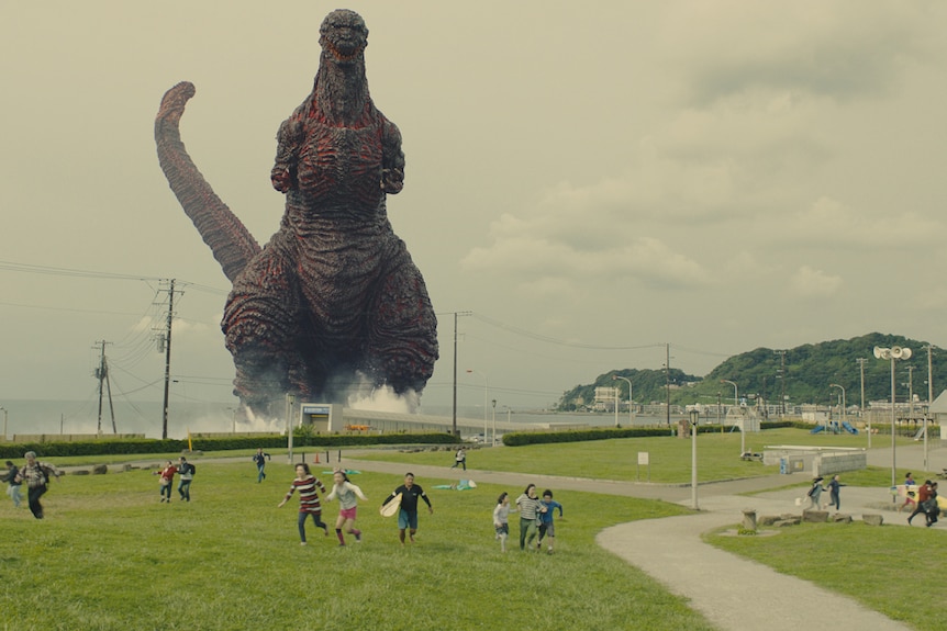 Children flee Godzilla in a scene from the 2016 film Shin Godzilla.