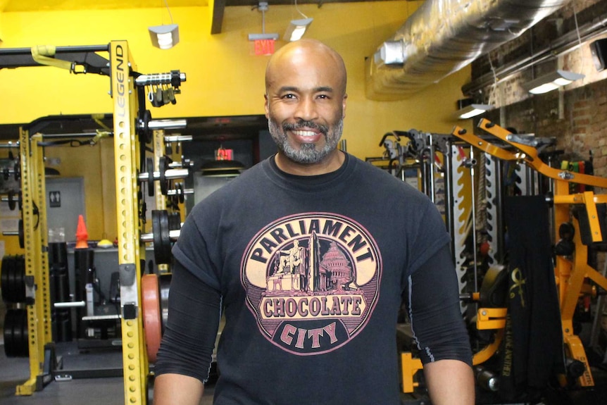 A man standing in a gym