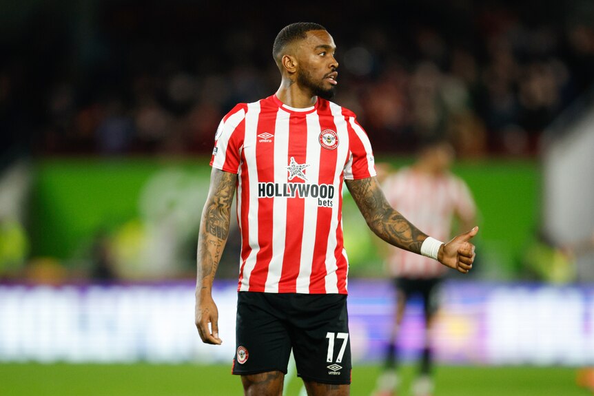 Ivan Toney looks to the side as he gives a thumbs up.