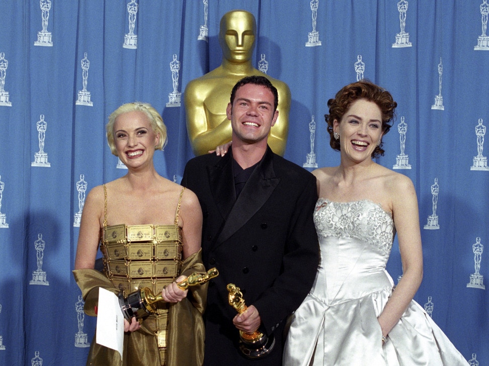 Lizzy Gardiner and Tim Chappel accepting an Academy Award at the 1995 Oscars for their costume design in Priscilla.