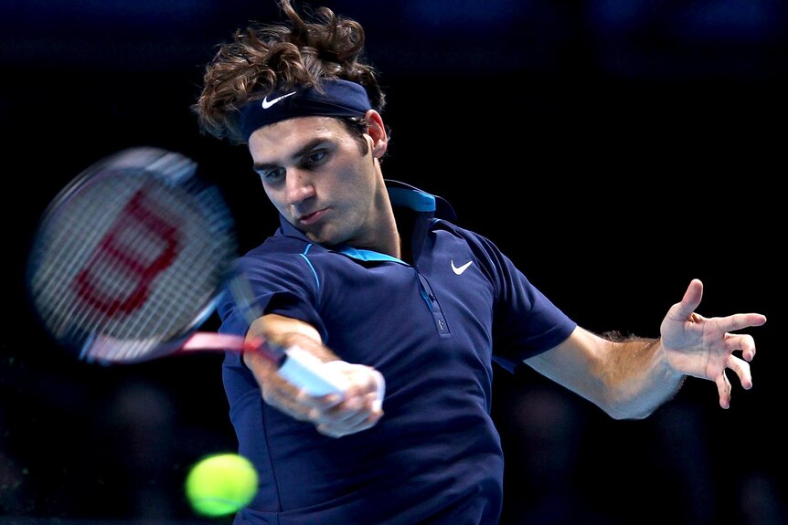 Roger Federer returns a shot during the ATP World Tour Finals.