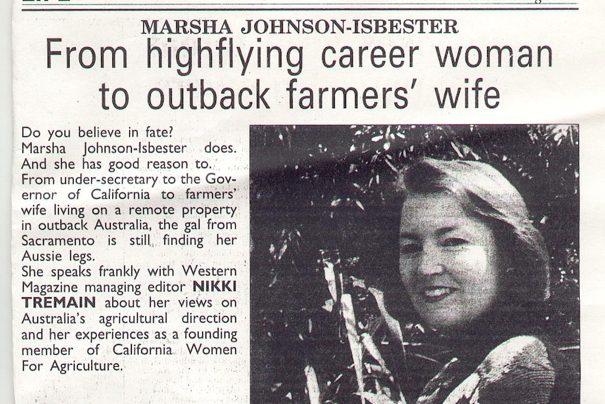 A newspaper clipping showing a woman's face.