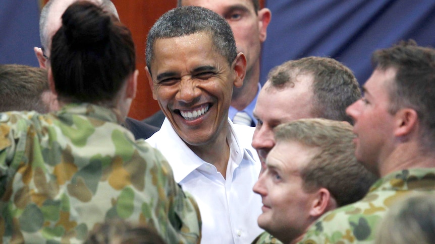 Obama shakes hands with troops (Reuters: Larry Downing)