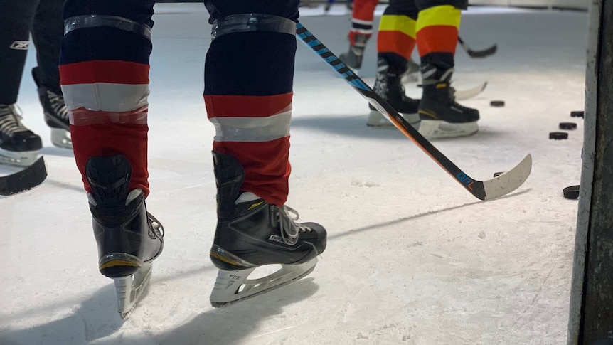 Skates worn by ice hockey players, as well as hockey sticks and pucks.