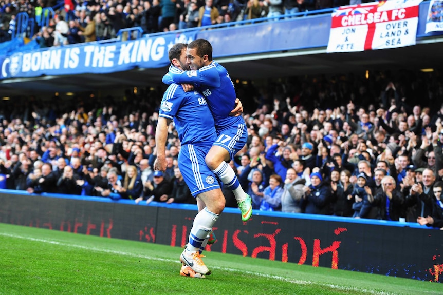 Eden Hazard (R) celebrates another goal in Chelsea's win over Newcastle