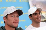 Lance Armstrong and his Astana team-mate Alberto Contador talk to the press in 2008.