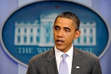 Barack Obama has signed new sanctions targeting Iran's central bank and financial sector.