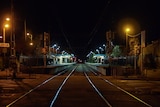 An empty train station at night during Melbourne's coronavirus curfew
