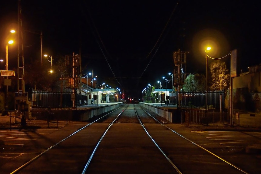 An empty train station at night during Melbourne's coronavirus curfew