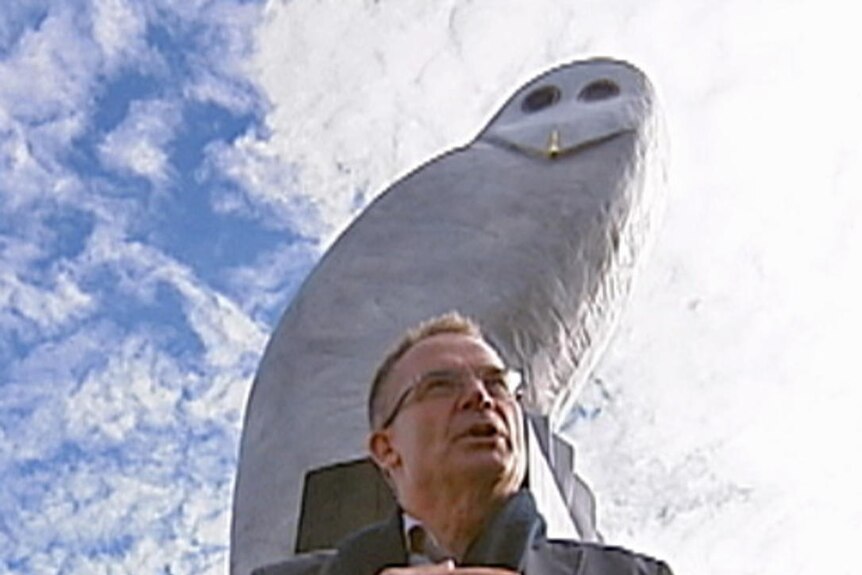 Former ACT chief minister Jon Stanhope in front of one of his government's public artworks.