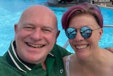 Max Winchester and his wife Tiffany smile and pose together for a selfie in front of a pool.