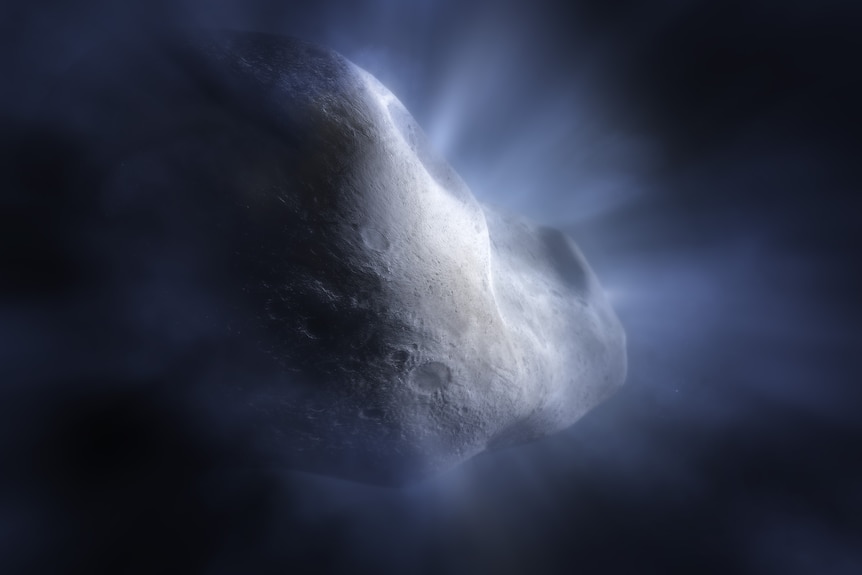 A digital illustration of a lumpy comet body emitting gas in a halo around it.