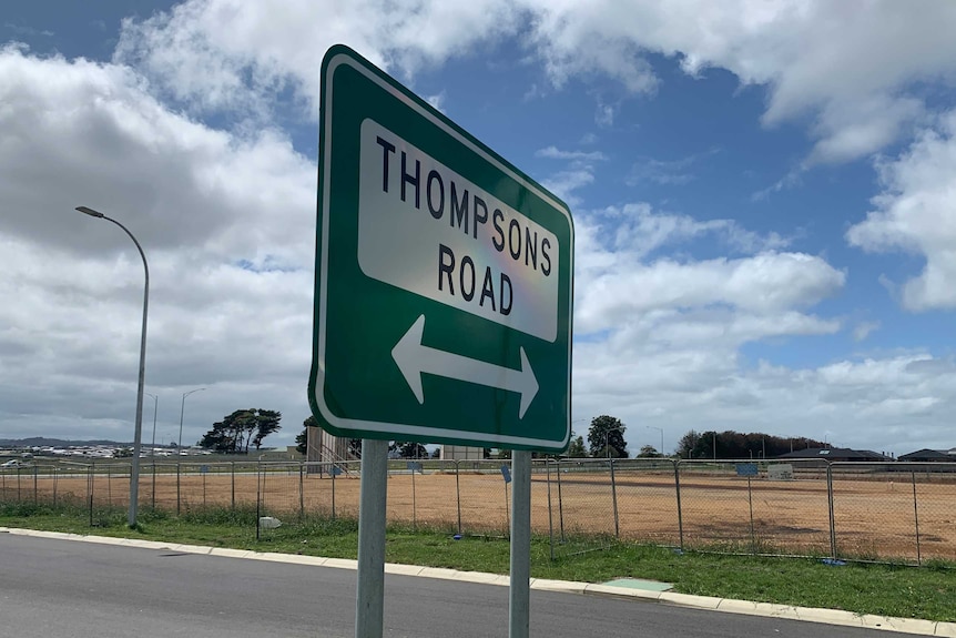 A road sign for Thompsons Road at Clyde North.