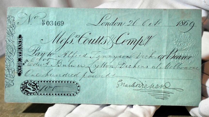 A personal cheque, signed by Charles Dickens, displayed at the National Library of Australia.