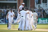 Moment of victory ... England celebrates after Graeme Swann took the final Australian wicket