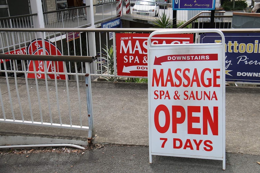 A sign offering massage services at a Nerang parlour, which was raided under suspicion of being an illegal brothel.