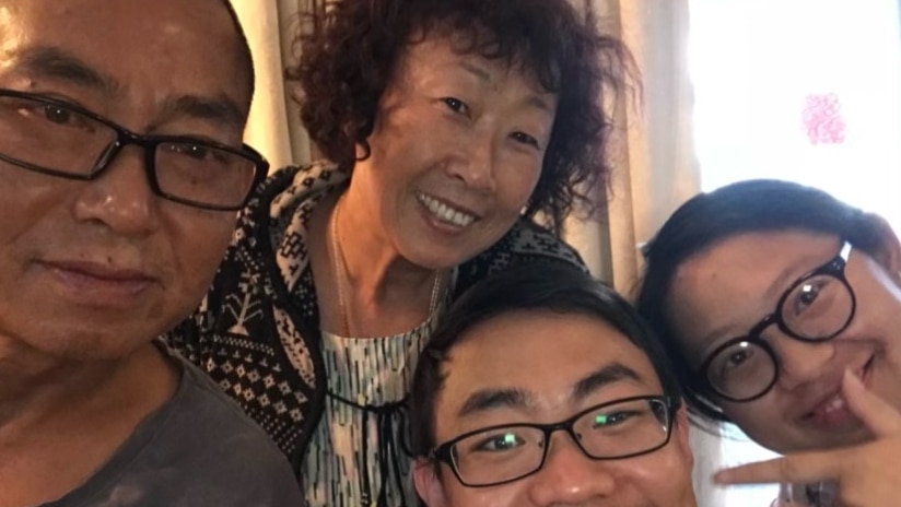 Dong Liu and his wife Lixia Wang, with their son Can Liu, his wife Julie Jin.