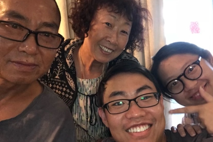Dong Liu and his wife Lixia Wang, with their son Can Liu, his wife Julie Jin.