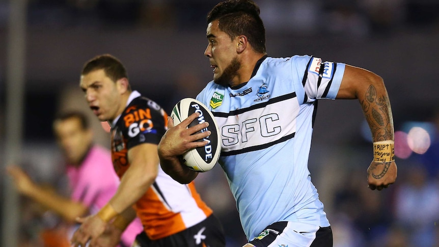 Andrew Fifita makes a line-break to score for the Sharks against Wests Tigers in July 2013.