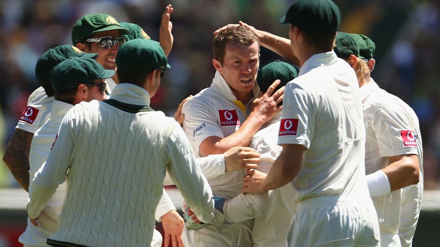 Peter Siddle is congratulated by team-mates after dismissing Sri Lankan captain Mahela Jayawardene.