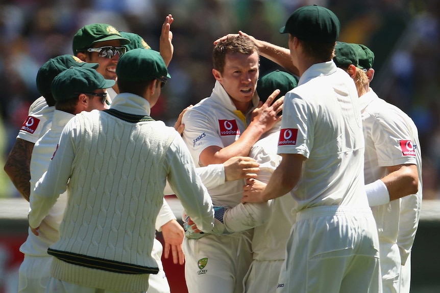 Peter Siddle is congratulated by team-mates after dismissing Sri Lankan captain Mahela Jayawardene.