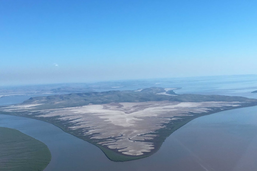 Aerial of island surrounded by ocean