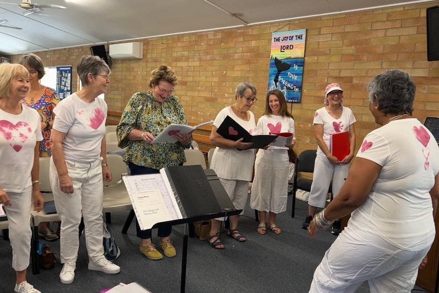 A group of women singing.