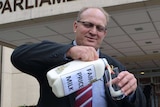 KAP MP Shane Knuth introduced the milk bill on Thursday but needs wider support.