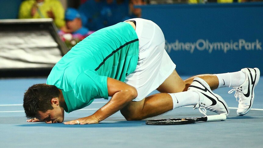 Australia's Bernard Tomic celebrates winning the men's final of the Sydney International tournament.