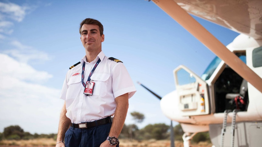 Chartair pilot Harvey Salameh stands in front of his plane in remote WA.