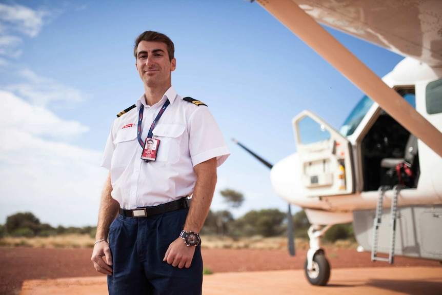 Chartair pilot Harvey Salameh stands in front of his plane in remote WA.