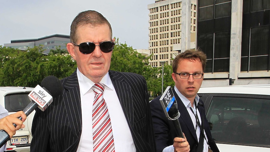 Peter Slipper arrives at the ACT Magistrates Court.