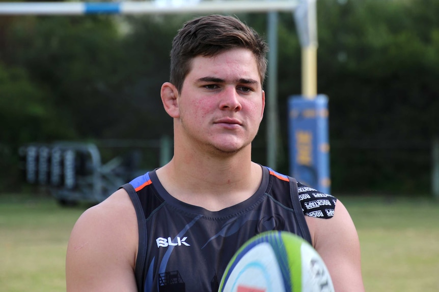 A mid shot of Western Force forward Richard Hardwick holding a rugby ball.