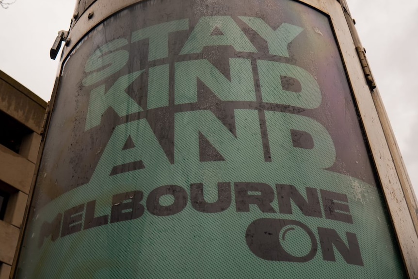 A sign urging Melbourne residents to be kind.