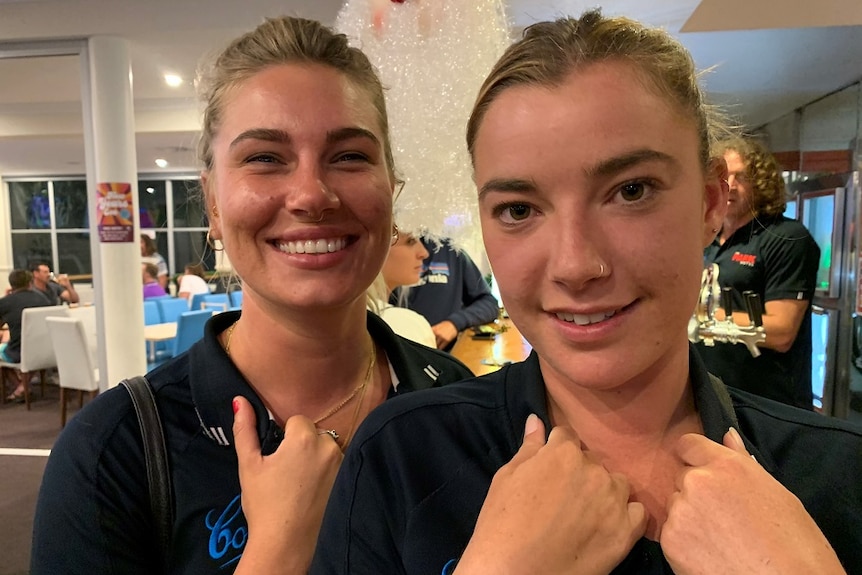 Hospitality worker Adriana Mijac enjoys a drink with a friend at a Byron Bay bar.