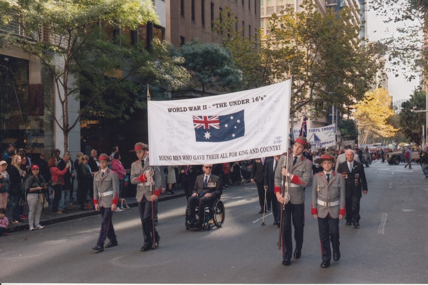 Dennis and Roy march in Anzac March 2018