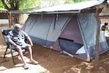 Djambawa Marawili AM outside his tent-house house at Baniyala in December 2020
