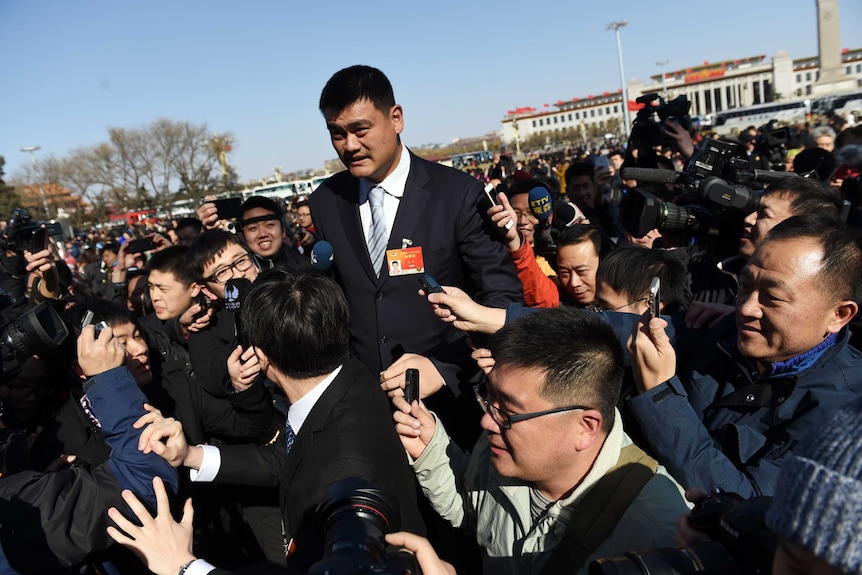 Chinese basketballer Yao Ming arrives for China's National People's Congress 2015
