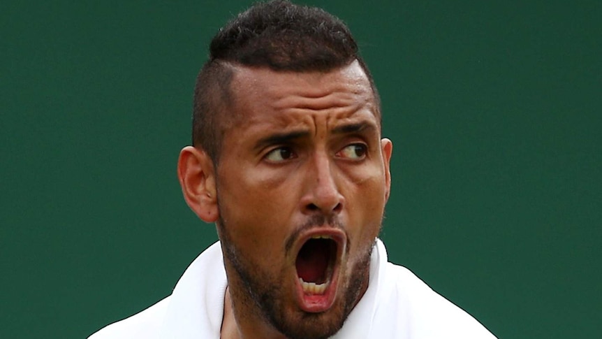 A close-up of Nick Kyrgios's face as he shouts angrily.